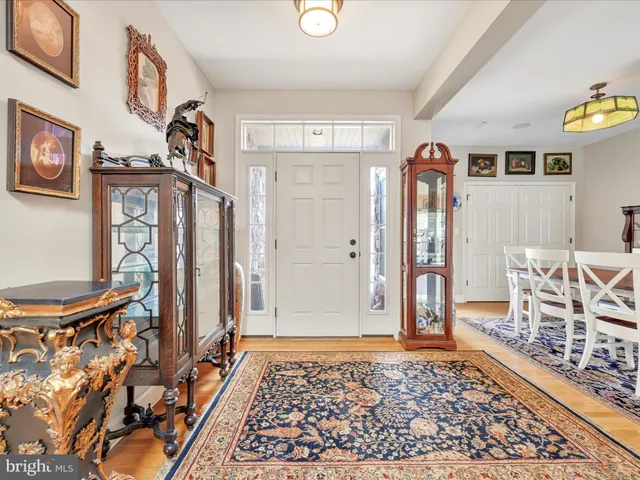 a view of a livingroom with furniture and front door