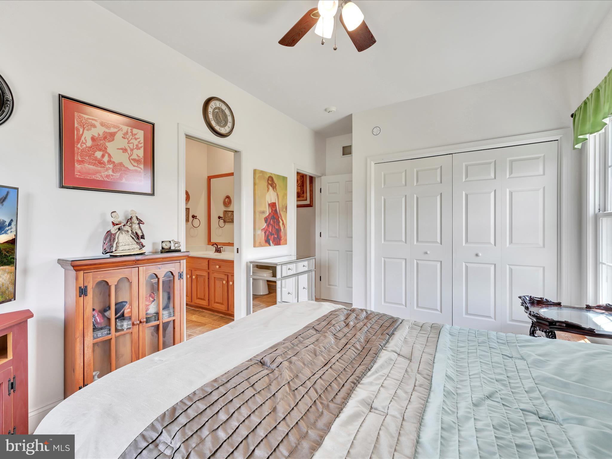 1120 Suedberg Road Pine Grove, PA 17963 - Photo 24 of 75 a bedroom with a bed and a chandelier