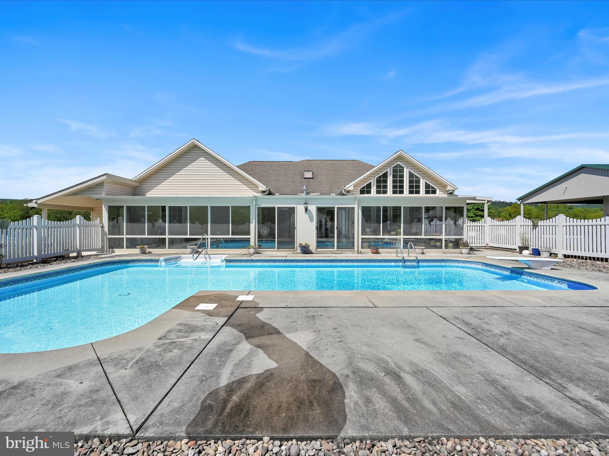 1120 Suedberg Road Pine Grove, PA 17963 - Photo 36 of 75 a view of pool with large trees and a big yard with a small yard