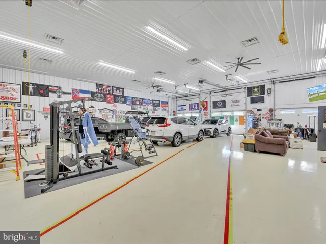 a view of a swimming pool with a yard and mountain view