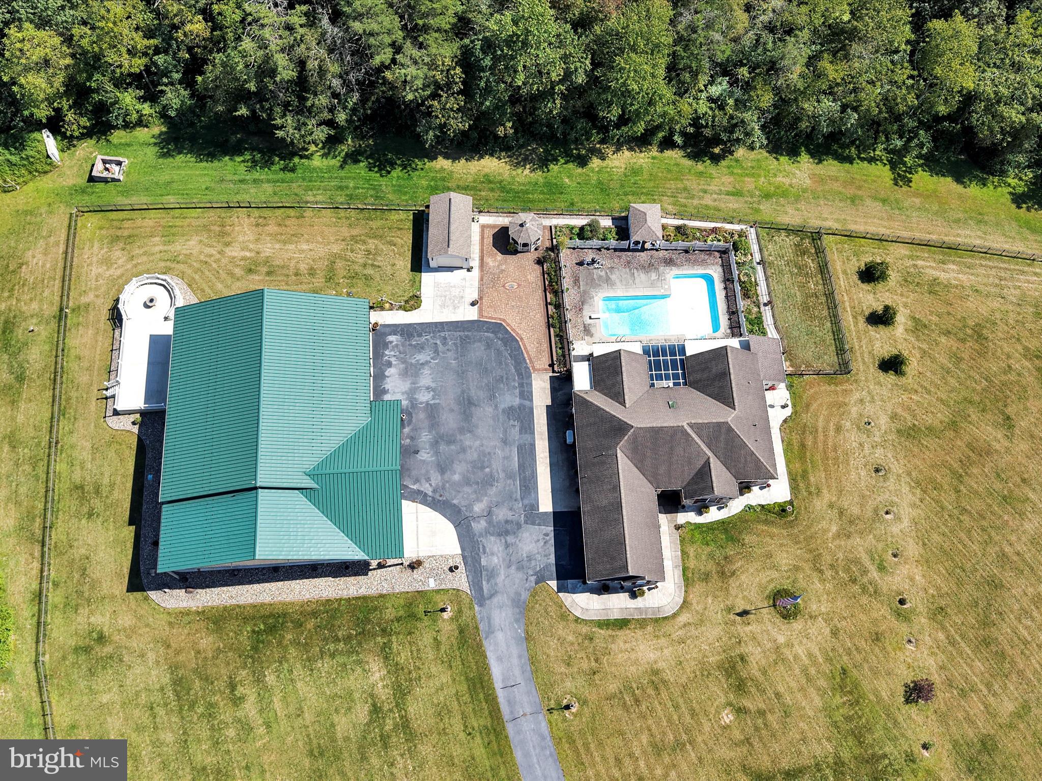 1120 Suedberg Road Pine Grove, PA 17963 - Photo 67 of 75 an aerial view of a house with a garden and lake view