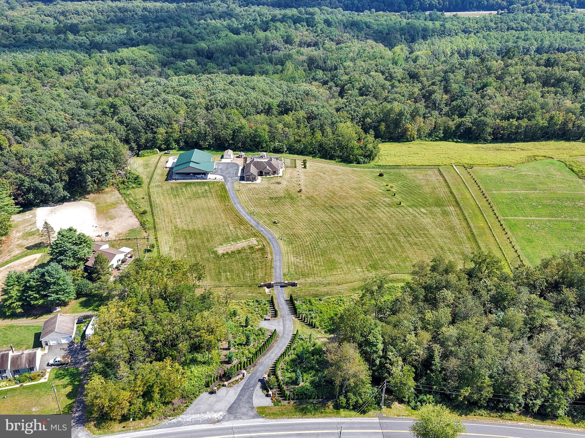 1120 Suedberg Road Pine Grove, PA 17963 - Photo 70 of 75 an aerial view of a residential houses with yard and trees in the background