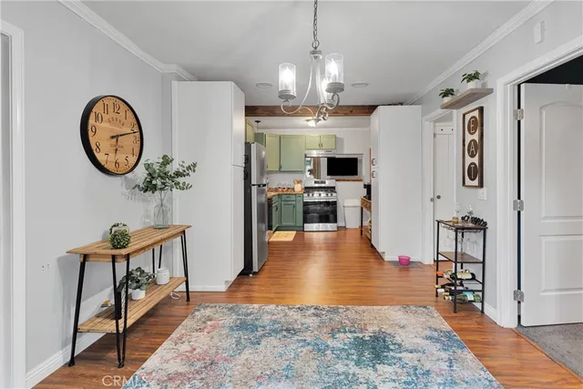 a view of a living room and dining room