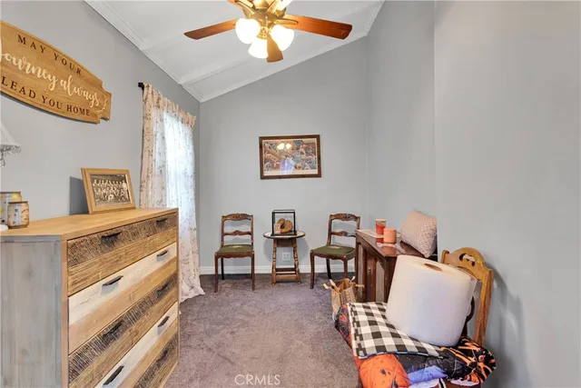 a view of workspace with furniture and window