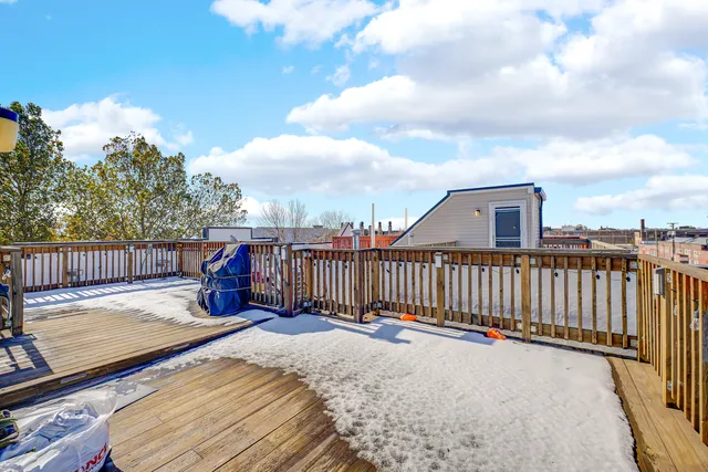 a view of a terrace with chairs