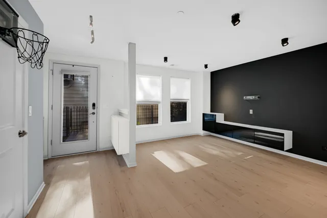 a view of an empty room with a window