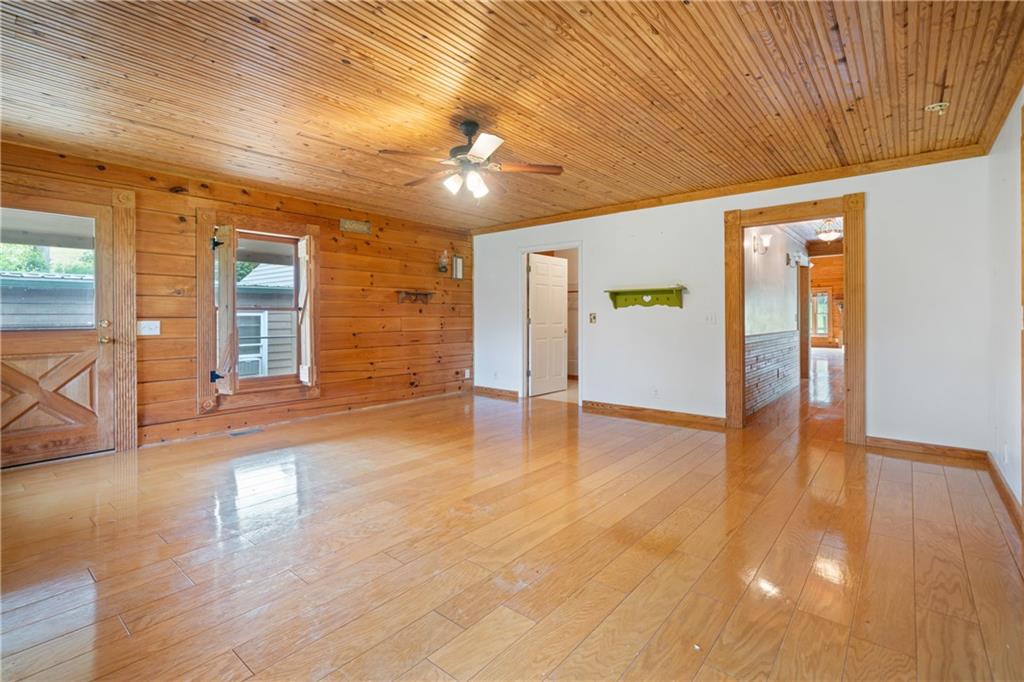 315 Woody Road Northwest Adairsville, GA 30103 - Photo 17 of 50 a view of empty room with wooden floor