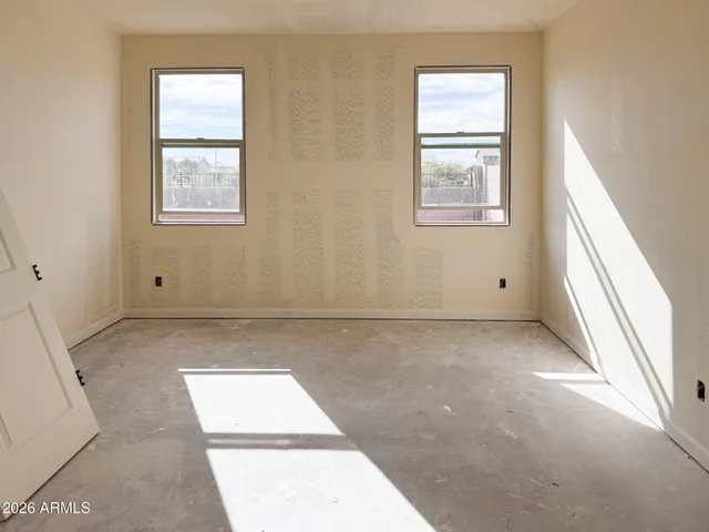 an empty room with windows