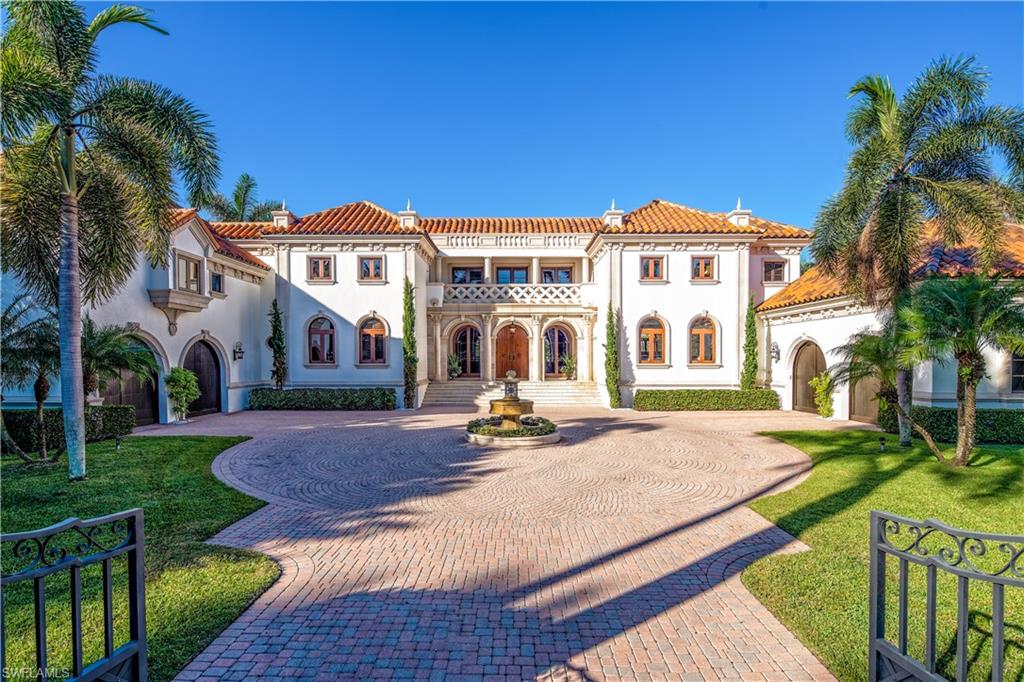 3600 Rum Row Naples, FL 34102 - Photo 20 of 20 front view of a house with a yard