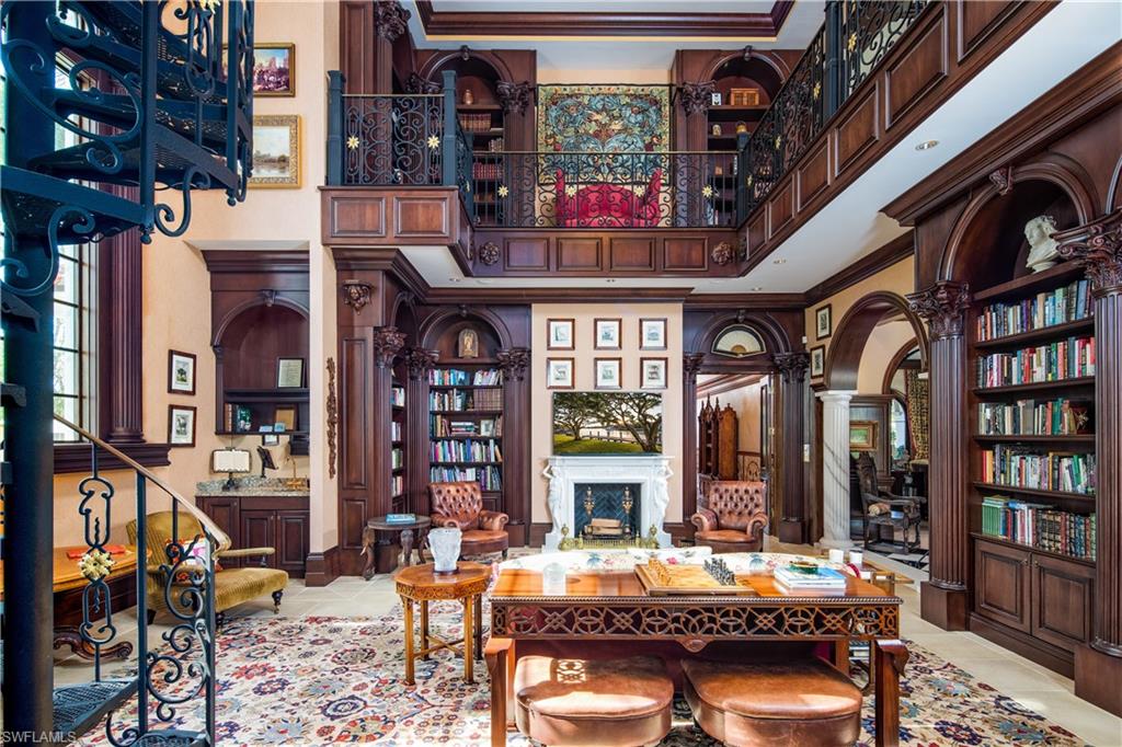 3600 Rum Row Naples, FL 34102 - Photo 5 of 20 a view of a building with sitting area