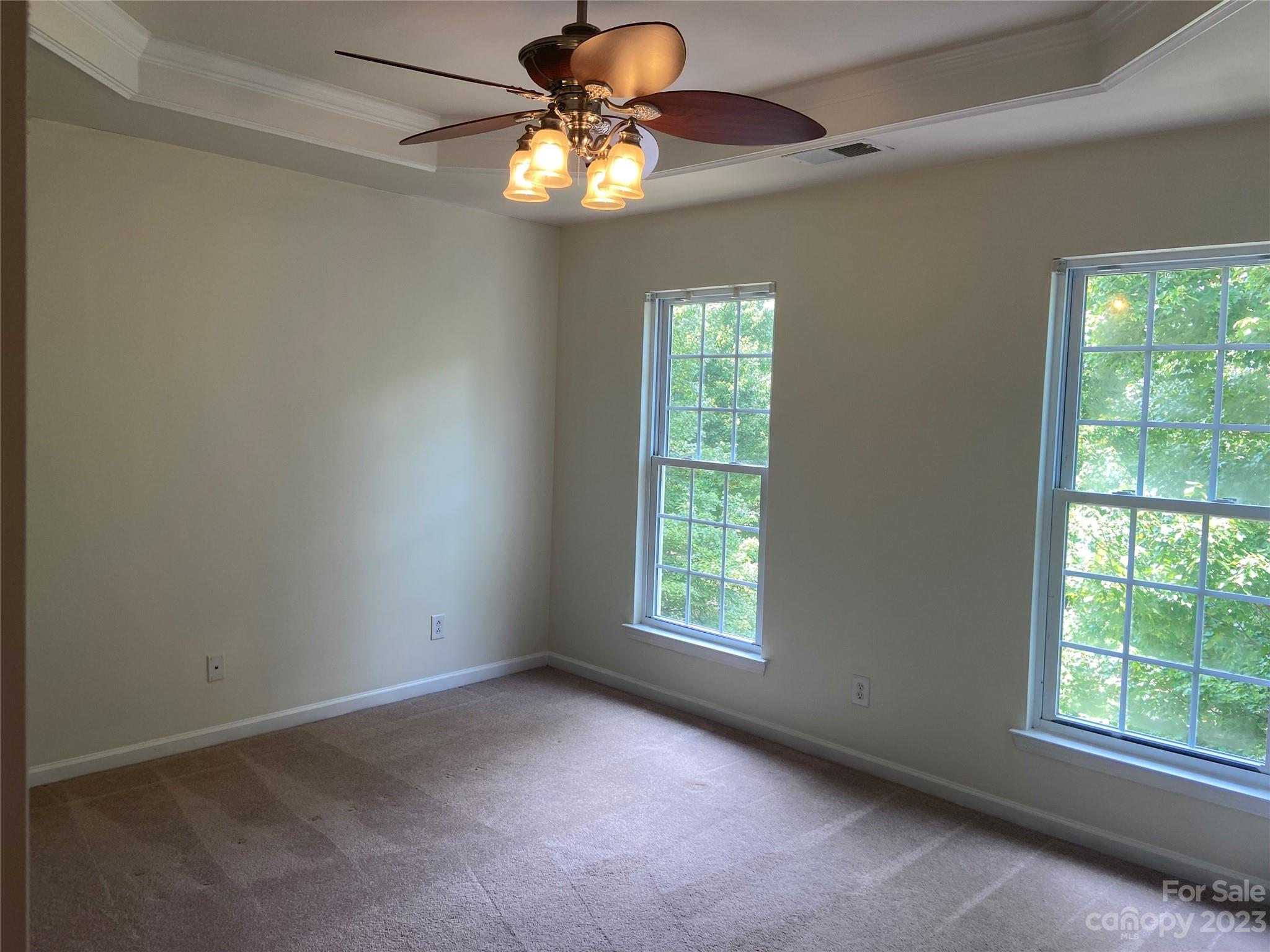 724 Passage Drive Fort Mill, SC 29708 - Photo 11 of 20 an empty room with a window and a fan