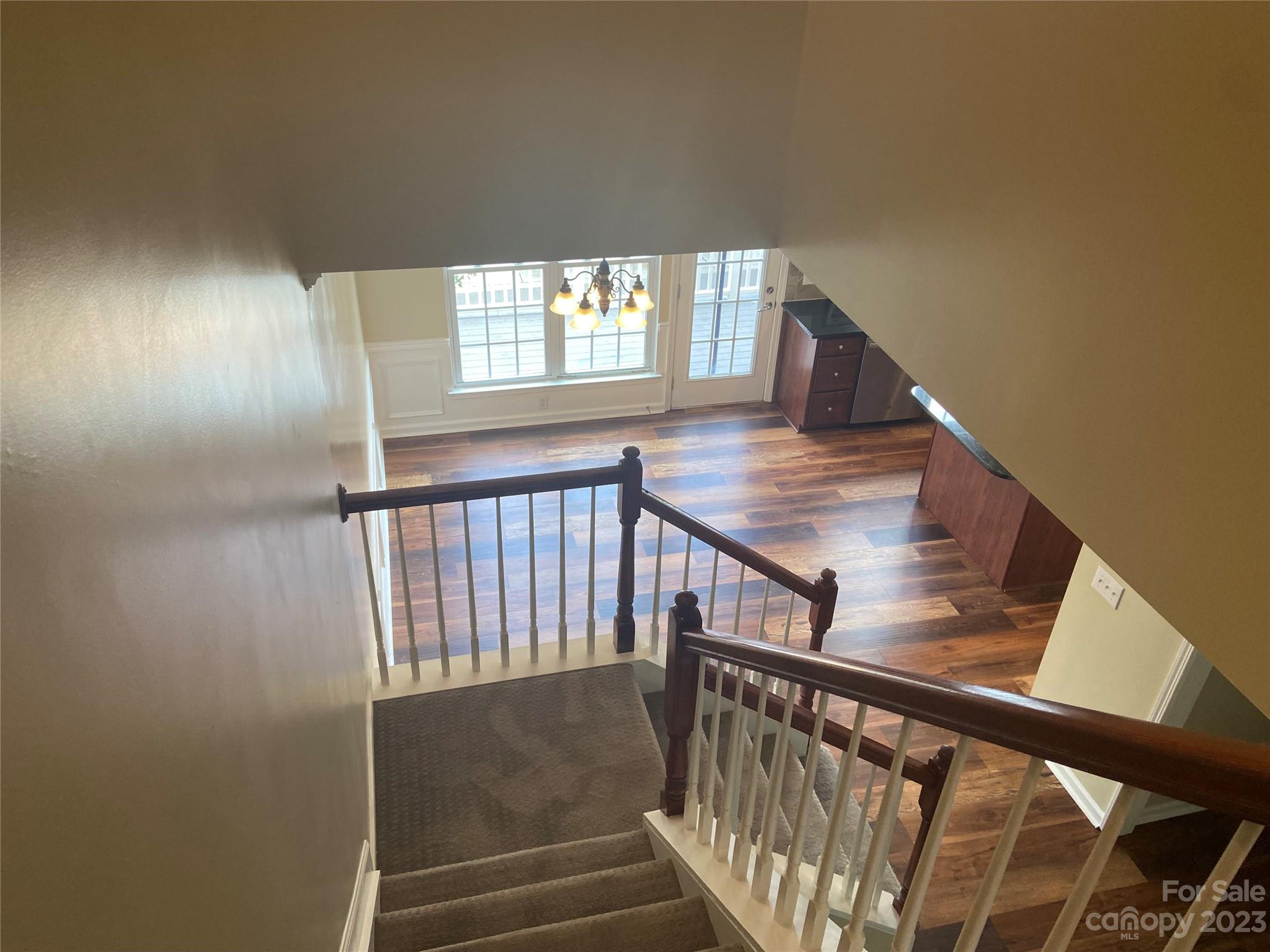 724 Passage Drive Fort Mill, SC 29708 - Photo 17 of 20 a view of entryway and hall with wooden floor
