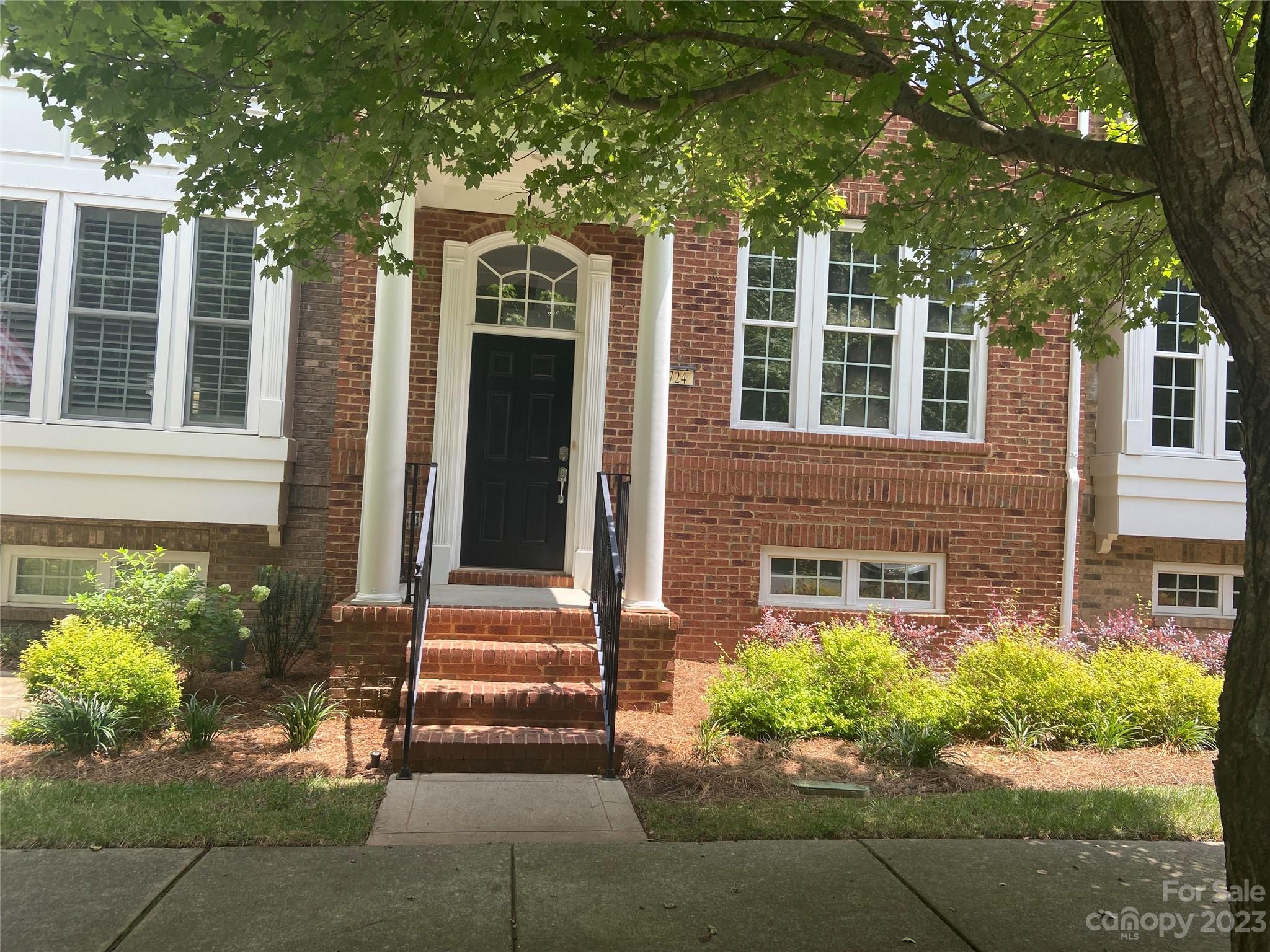 724 Passage Drive Fort Mill, SC 29708 - Photo 2 of 20 front view of a house with a yard