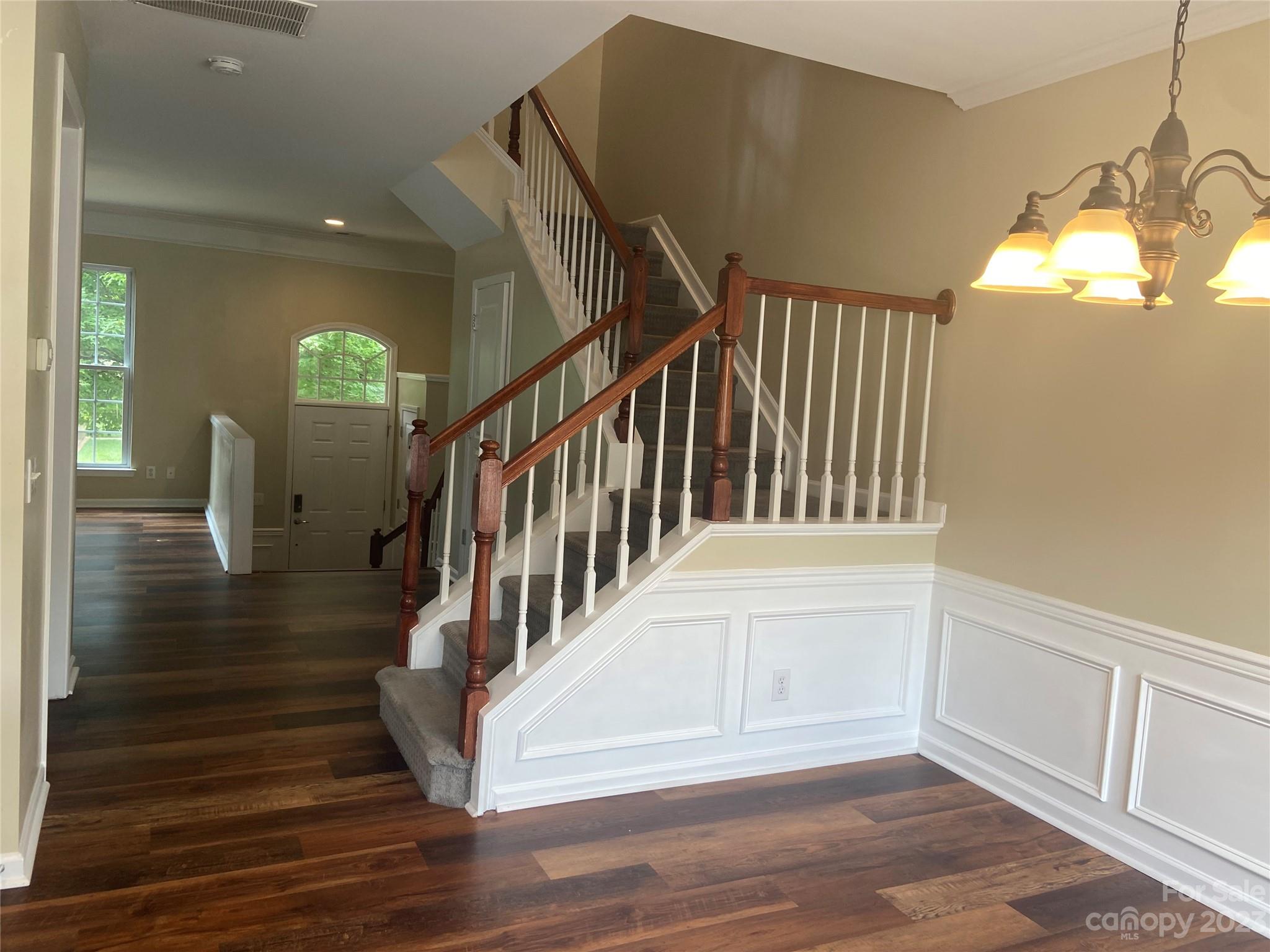 724 Passage Drive Fort Mill, SC 29708 - Photo 10 of 20 a view of entryway and hall with wooden floor