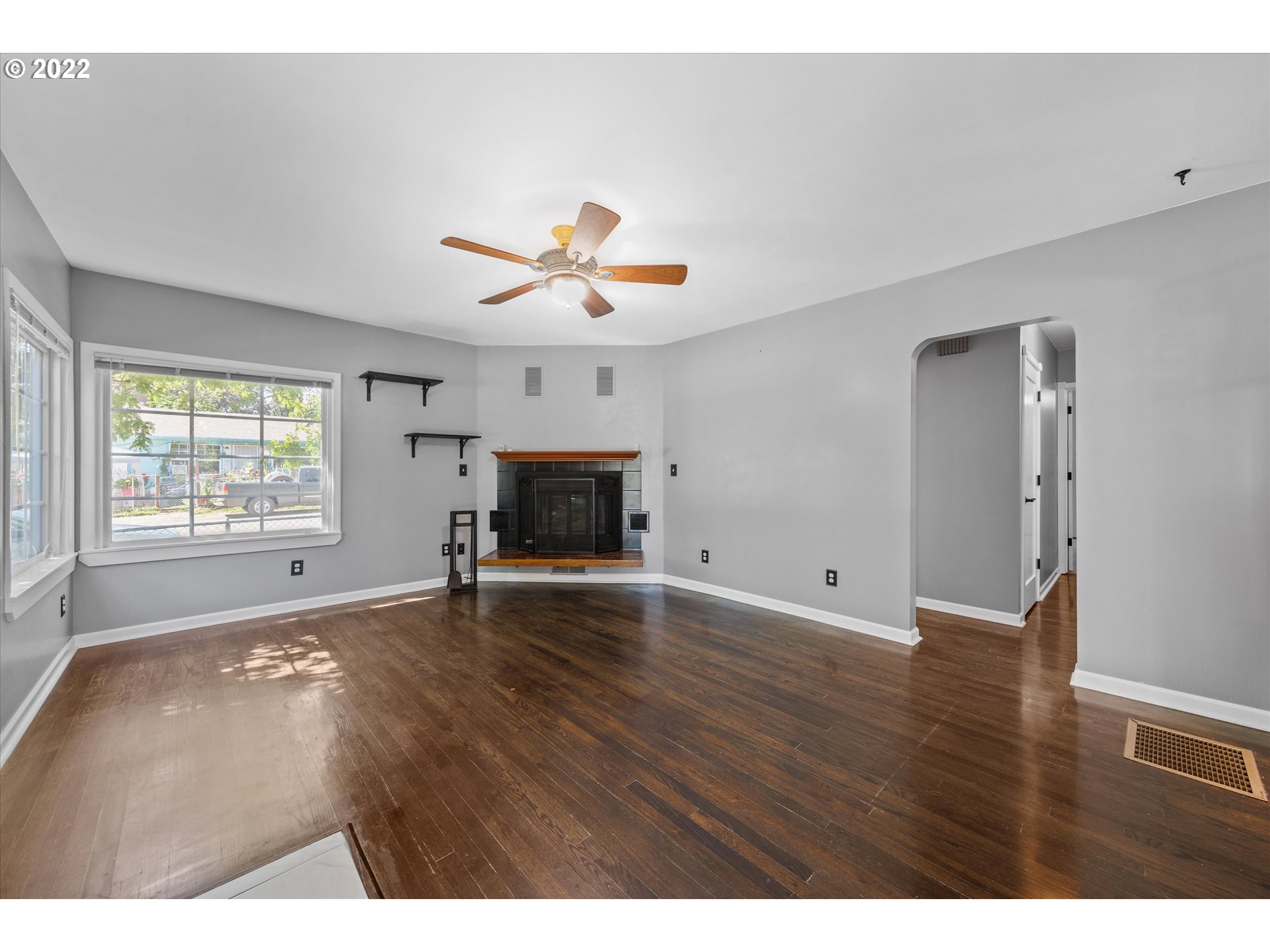 3200 R Street Vancouver, WA 98663 - Photo 4 of 32 a view of empty room with wooden floor and fan