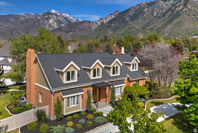 16 Gatehouse Lane Sandy, UT 84092 - Photo 3 of 73 Cape cod house featuring stunning mountain views of the Wasatch Front! All renovated. (landscaped AI enhanced)