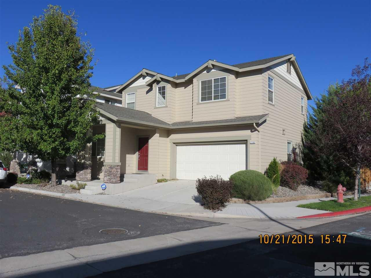 2198 Hellaby Lane Reno, NV 89502 - Photo 1 of 1 a front view of a house with a yard