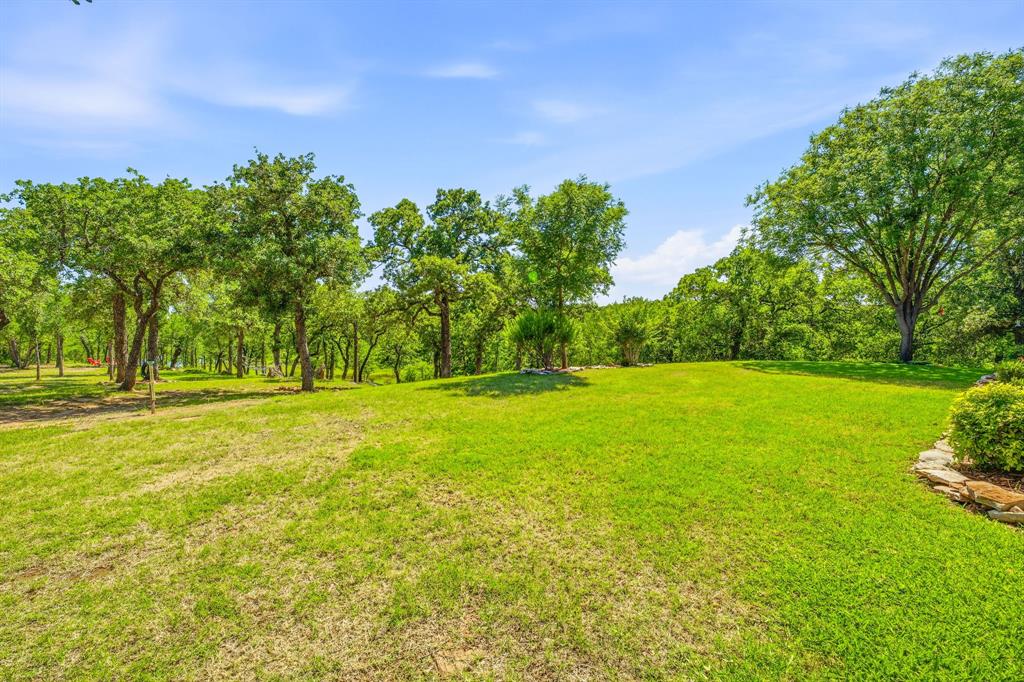 428 Timber Ridge Road Graham, TX 76450 - Photo 27 of 37 Open grassed area in the back yard