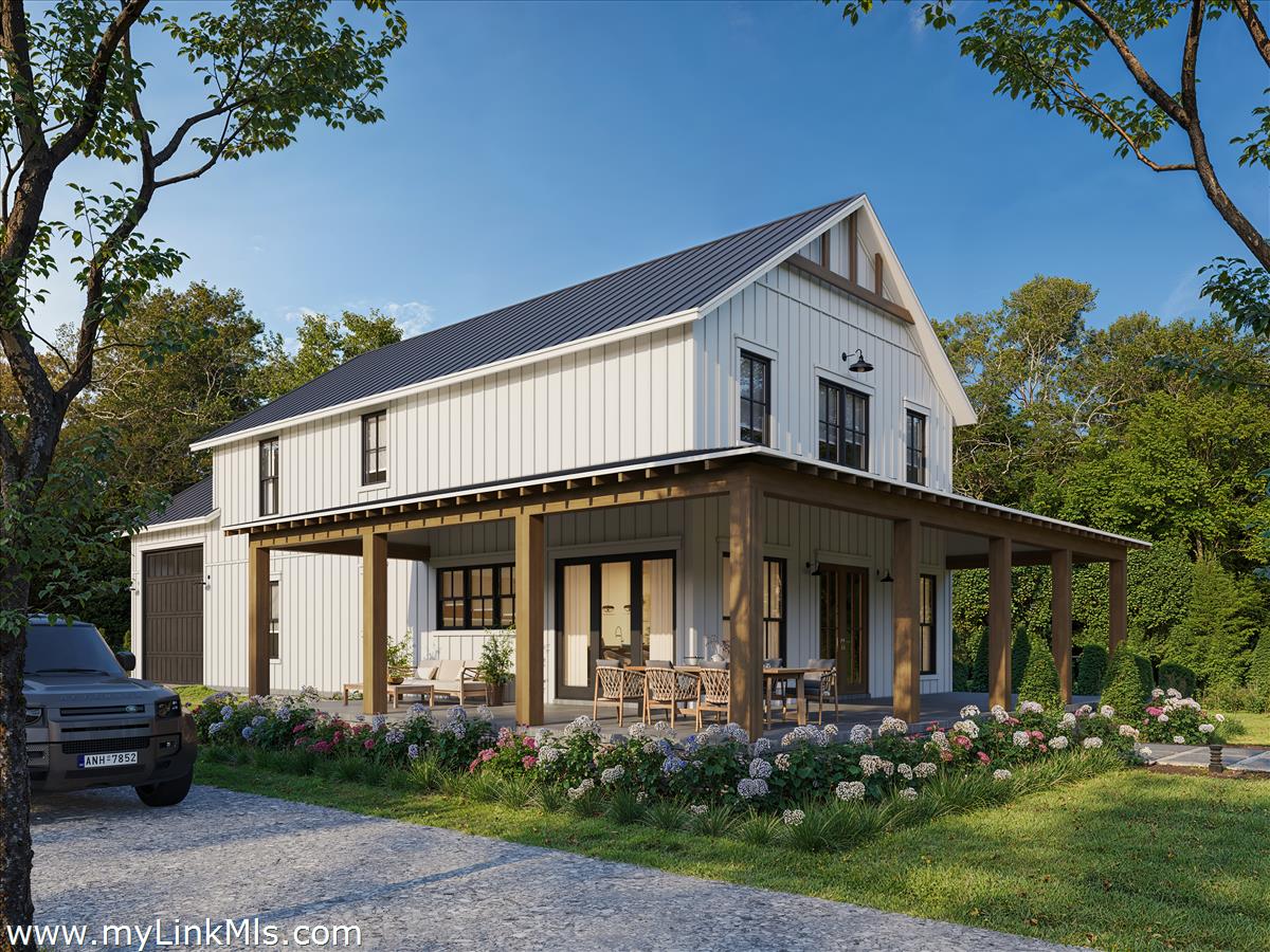2 Hopes Way Oak Bluffs, MA 02557 - Photo 2 of 3 a front view of a house with garden