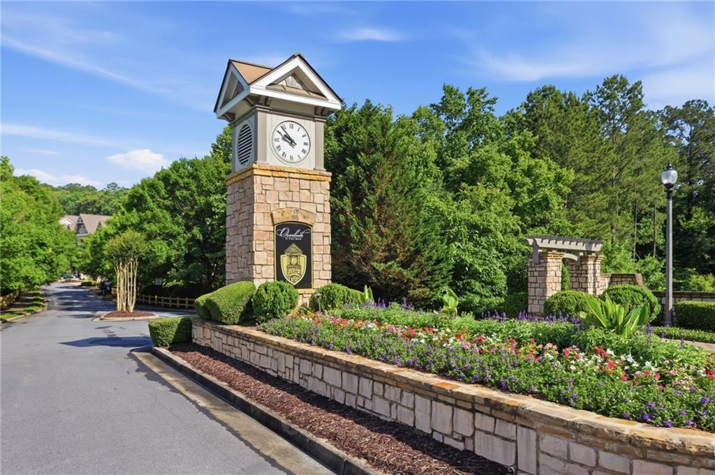 222 Trecastle Square, Unit 21 Canton, GA 30114 - Photo 32 of 33 a front view of a house with a garden