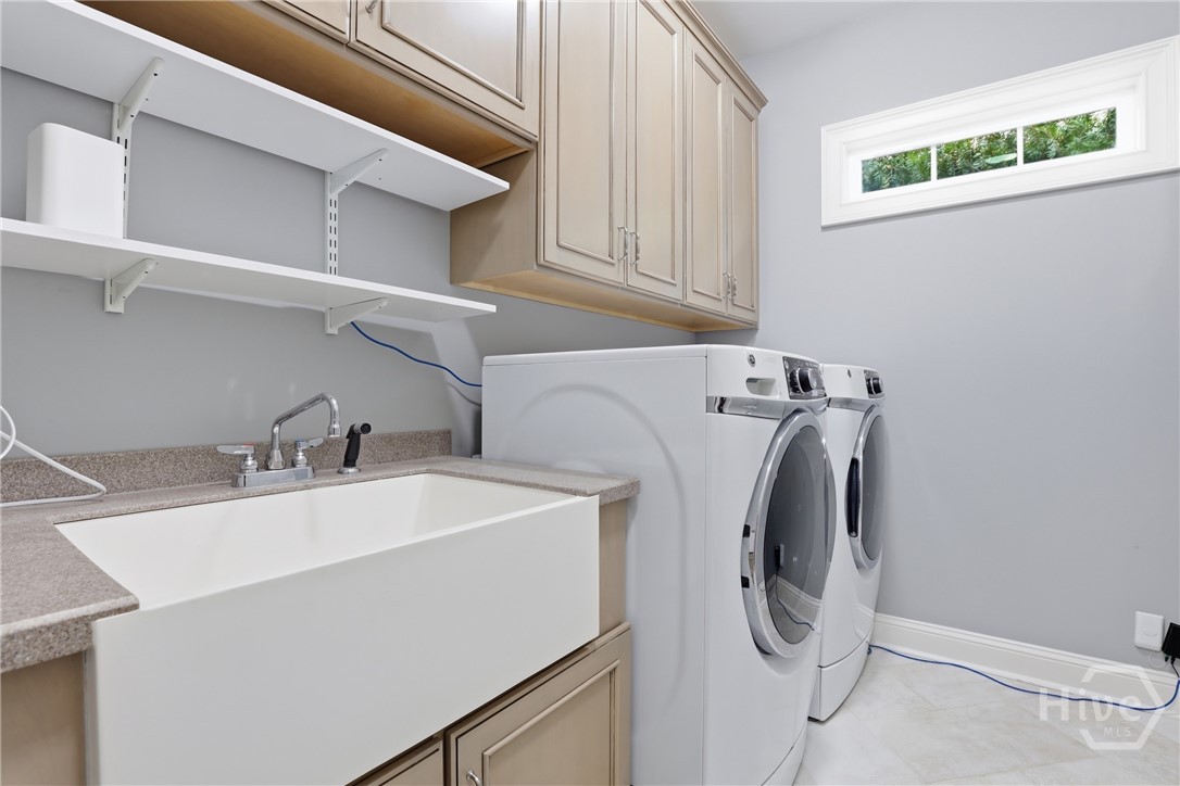 122 Mallory Place Pooler, GA 31322 - Photo 18 of 45 Laundry room with a sink and storage