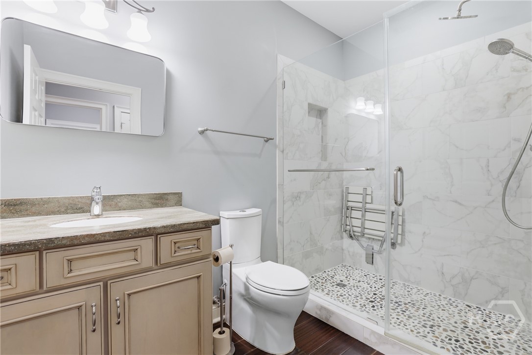 122 Mallory Place Pooler, GA 31322 - Photo 21 of 45 Hall full bathroom with ADA features in the shower