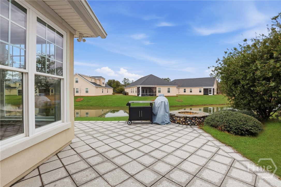 122 Mallory Place Pooler, GA 31322 - Photo 26 of 45 Beautifully paved patio space with a fire pit