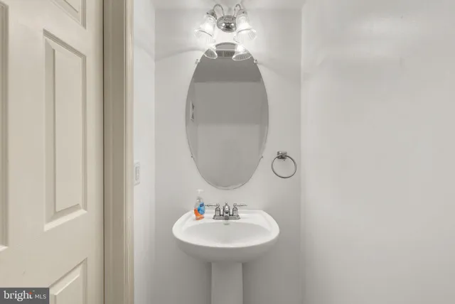 a bedroom with bed couch and window