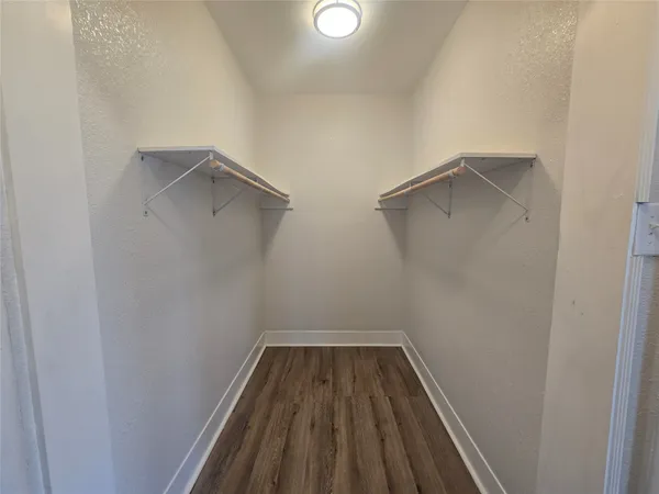 a view of a room with racks on the wall
