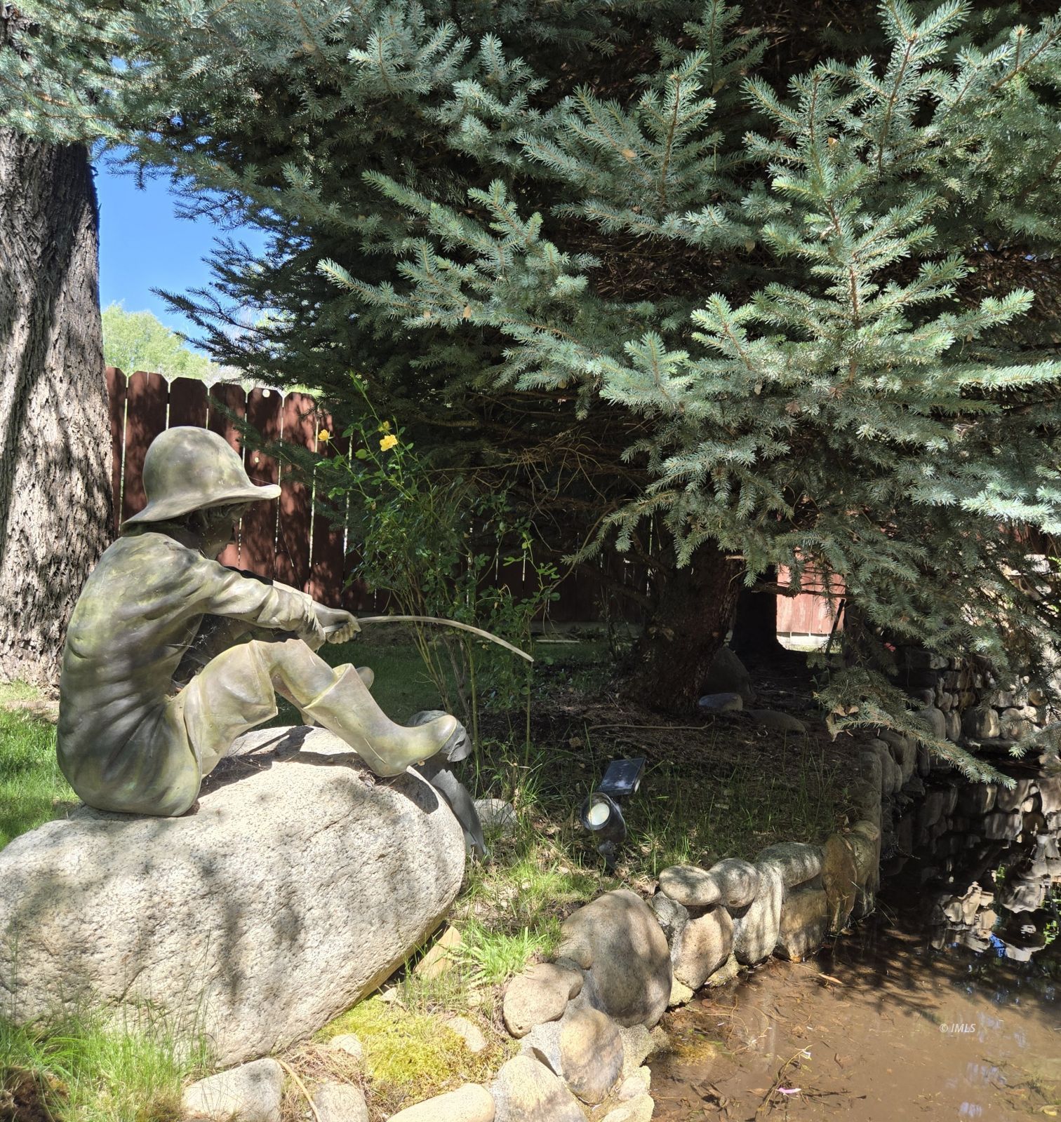 221 Mt Tom Road Bishop, CA 93514 - Photo 21 of 23 Statue by the creek