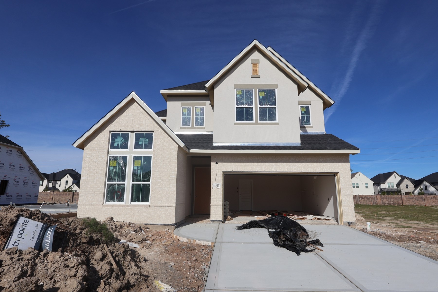 4919 Northern Wds Drive Spring, TX 77386 - Photo 4 of 6 a front view of a house with a yard