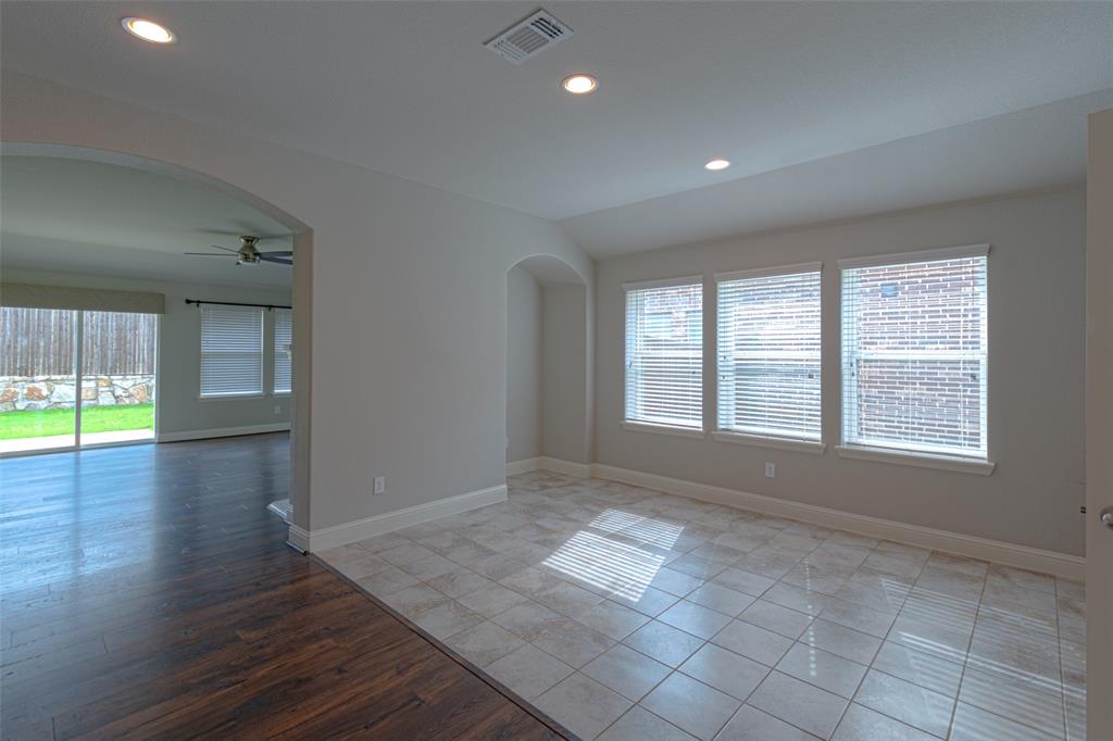 616 England Street Fate, TX 75189 - Photo 12 of 40 Dining room with a wealth of natural light, ceiling fan, and light tile floors