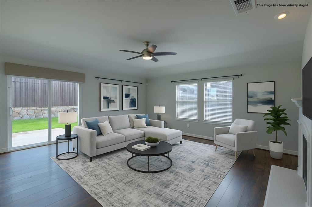 616 England Street Fate, TX 75189 - Photo 13 of 40 Visual staged Living room with ceiling fan, dark wood-style flooring, and recessed lighting