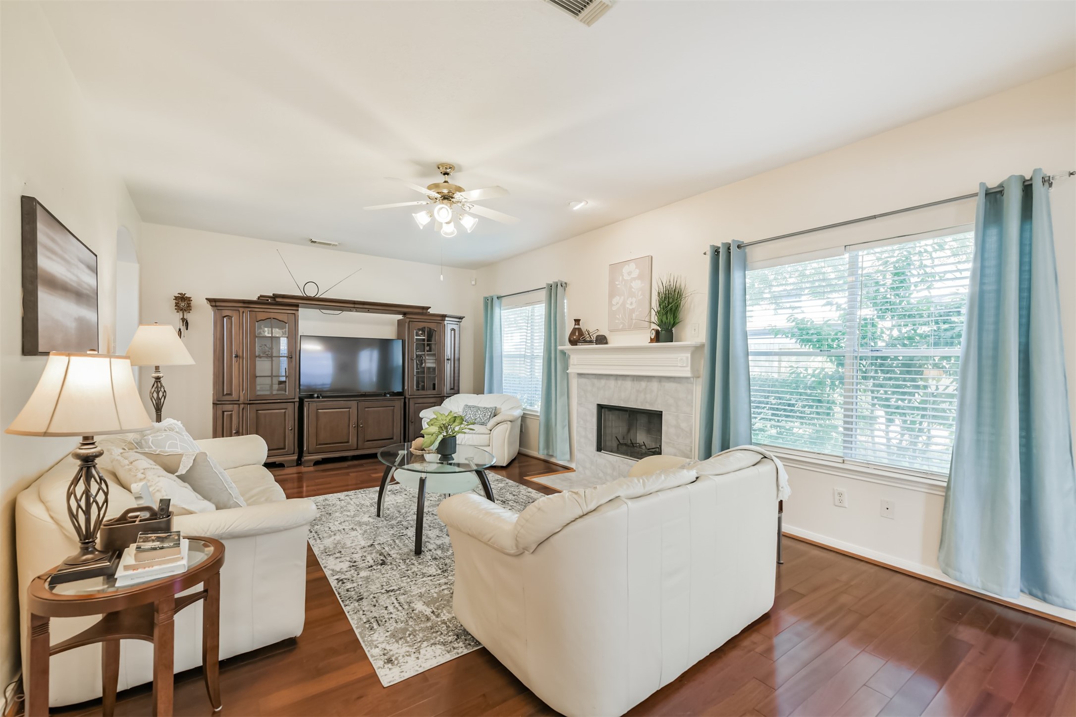 9206 Memorial Hills Drive Spring, TX 77379 - Photo 11 of 50 a living room with furniture and a fireplace