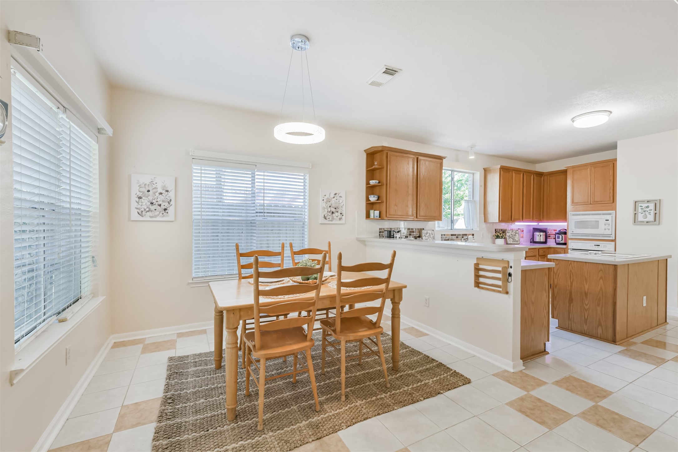 9206 Memorial Hills Drive Spring, TX 77379 - Photo 22 of 50 a view of a dining room with furniture and window