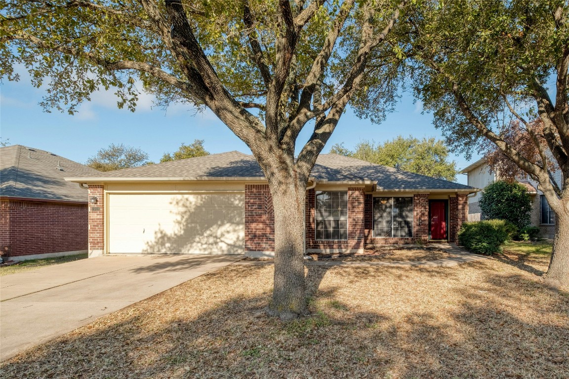 1308 Lochaline Loop Pflugerville, TX 78660 - Photo 1 of 1 a view of a house with snow on the wall