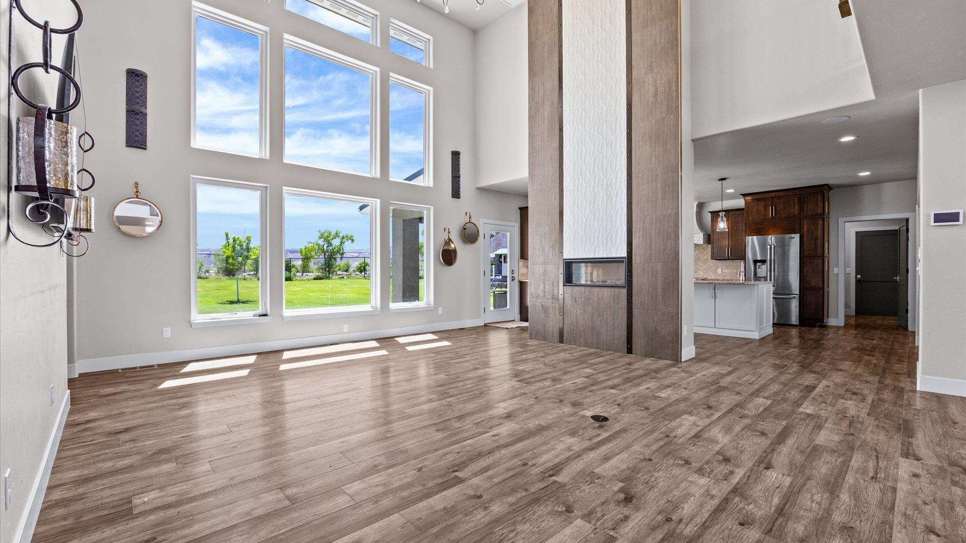 2041 J J 1/2 Road Fruita, CO 81521 - Photo 4 of 42 a view of an entryway with wooden floor and windows