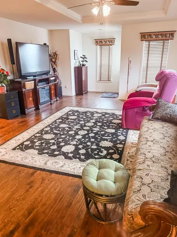 a living room with a couch and a flat screen tv