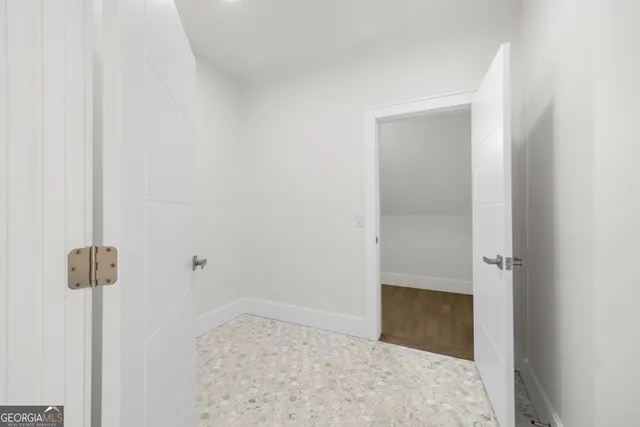 a view of balcony with seating area