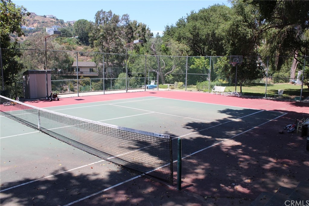 0 Woodcliffe Road Pasadena, CA 91105 - Photo 8 of 18 a view of a tennis ground with large trees