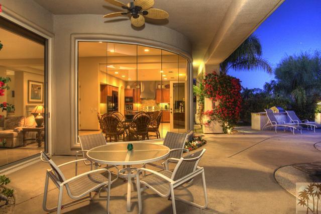 308 Loch Lomond Road Rancho Mirage, CA 92270 - Photo 21 of 25 a patio with a table and chairs