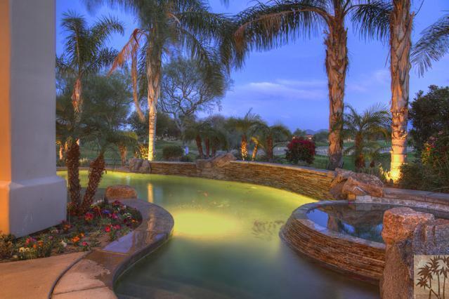 308 Loch Lomond Road Rancho Mirage, CA 92270 - Photo 24 of 25 a view of swimming pool with a table and chairs