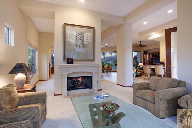 308 Loch Lomond Road Rancho Mirage, CA 92270 - Photo 3 of 25 a living room with furniture and a fireplace