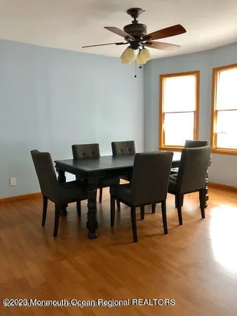 a view of a dining room with furniture