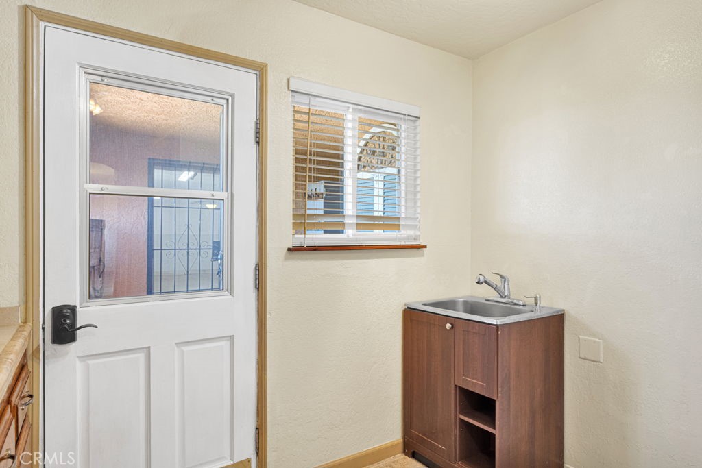 9072 Green Road Pinon Hills, CA 92372 - Photo 21 of 70 service porch off side entry & breezeway