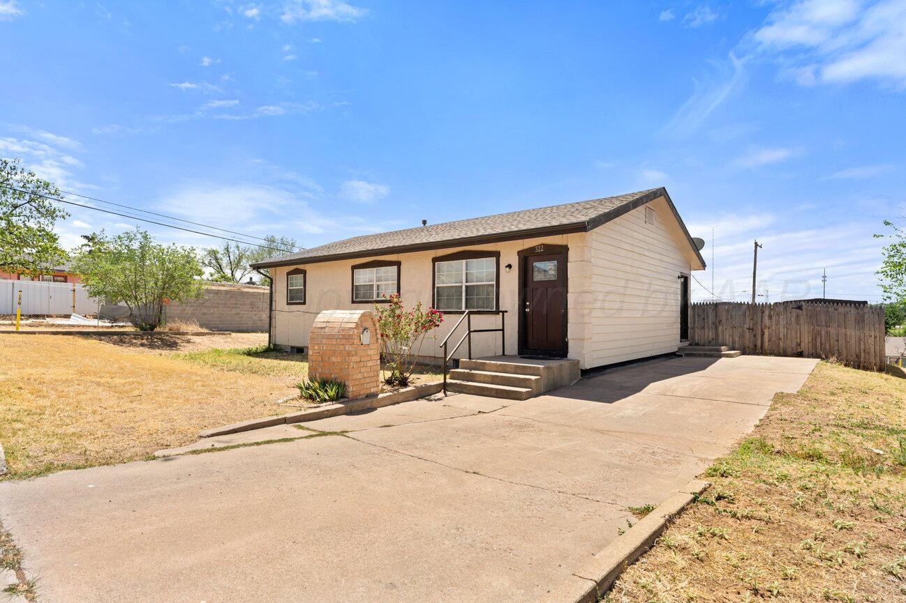 322 Poplar Street Amarillo, TX 79107 - Photo 2 of 42 a view of a house with snow on the ground