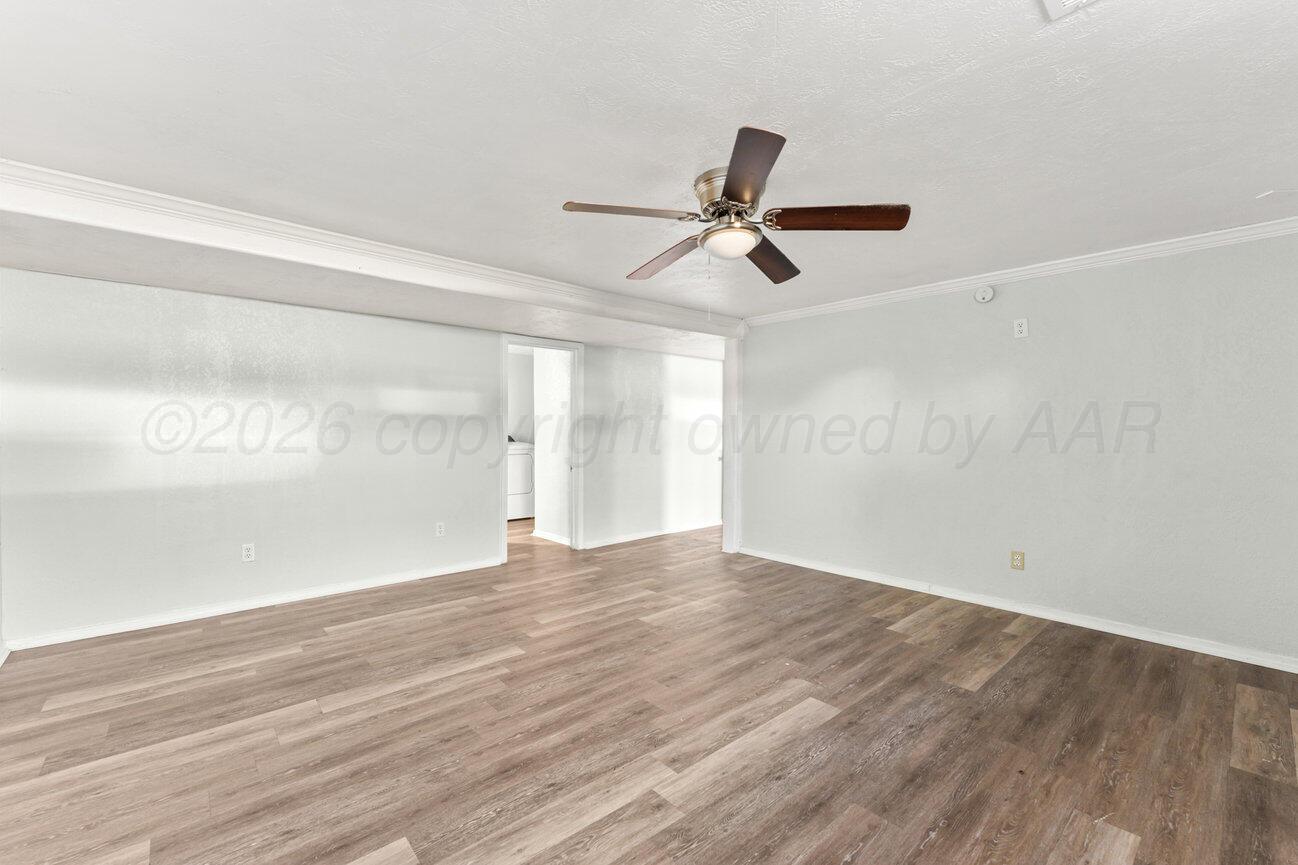 322 Poplar Street Amarillo, TX 79107 - Photo 33 of 42 wooden floor in an empty room