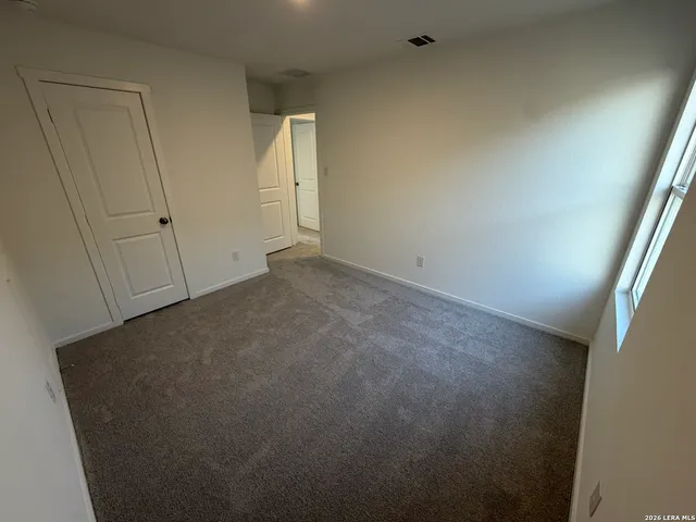 an empty room with an entryway