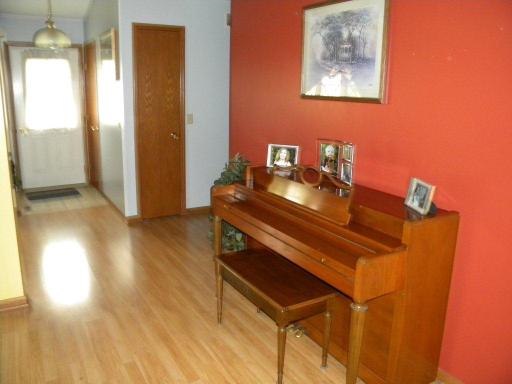 25425 Indian Ridge Road Sterling, IL 61081 - Photo 5 of 12 a view of a workspace with furniture and wooden floor