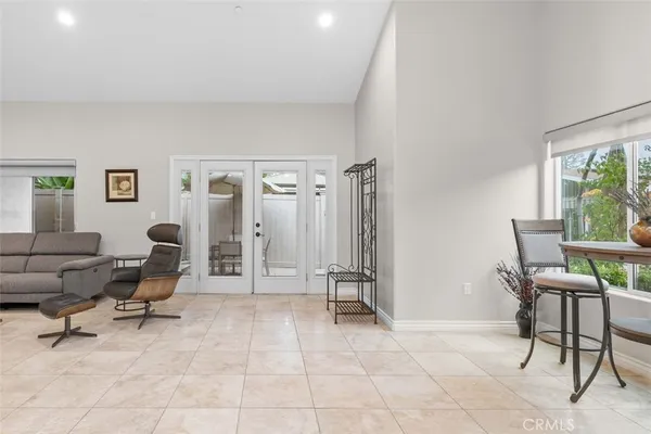 a work room with furniture and a window